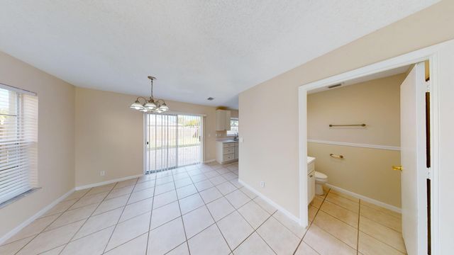 140 Pheasant Run Boulevard, West Palm Beach, FL 33415