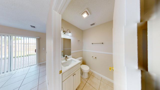 140 Pheasant Run Boulevard, West Palm Beach, FL 33415