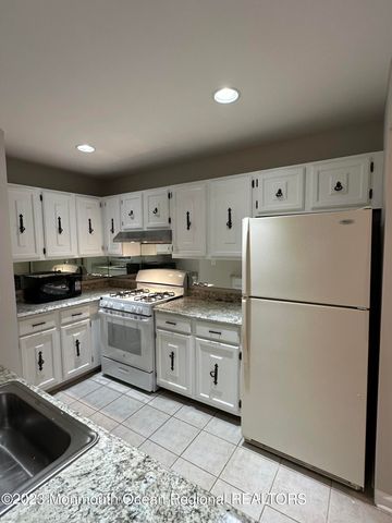 143 Tanglewood Place, Morganville, NJ 07751