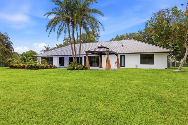 15555 De Havilland Court, Wellington, FL 33414