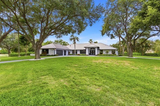15555 De Havilland Court, Wellington, FL 33414