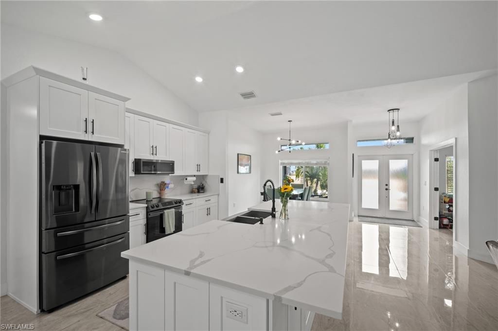 Image 6 of property listing at 2702 NE 1st AVE, Cape Coral, FL 33909