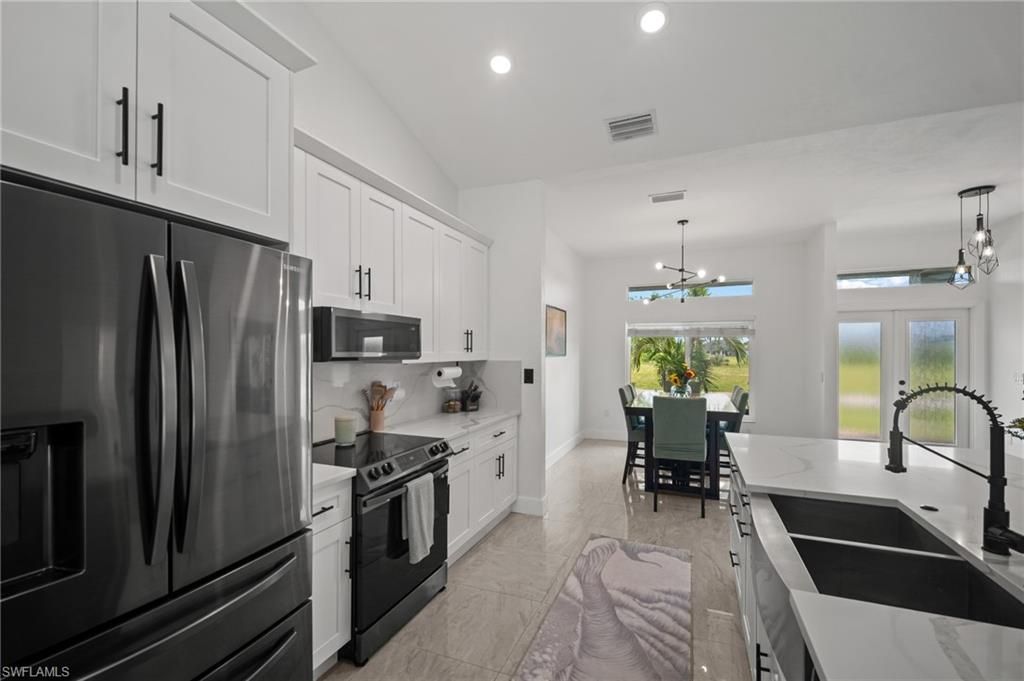 Image 9 of property listing at 2702 NE 1st AVE, Cape Coral, FL 33909