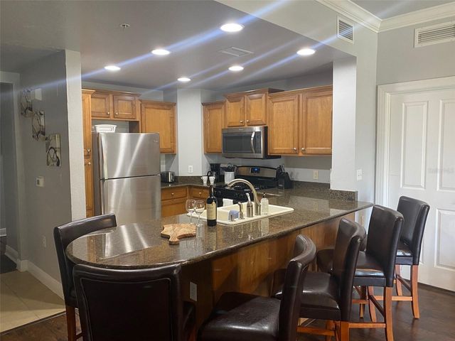 1598 HERITAGE CROSSING COURT 201, Reunion, FL 34747