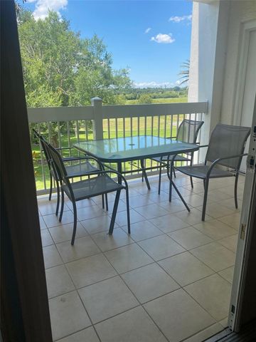 1598 HERITAGE CROSSING COURT 201, Reunion, FL 34747