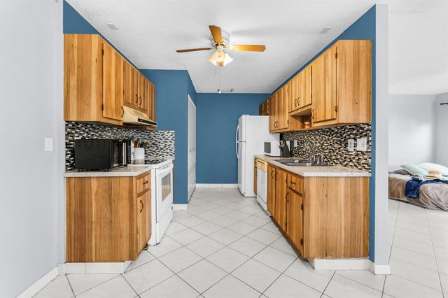 3360 NE Rossi Court NE, West Palm Beach, FL 33417