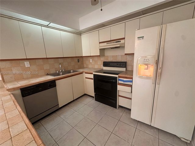 8810 SW 132nd Place 401DN, Miami, FL 33186