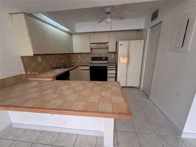 8810 SW 132nd Place 401DN, Miami, FL 33186