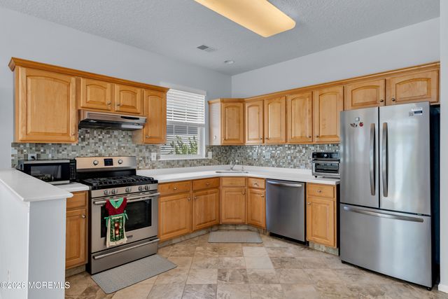 8 April Springs Court, Lakewood, NJ 08701