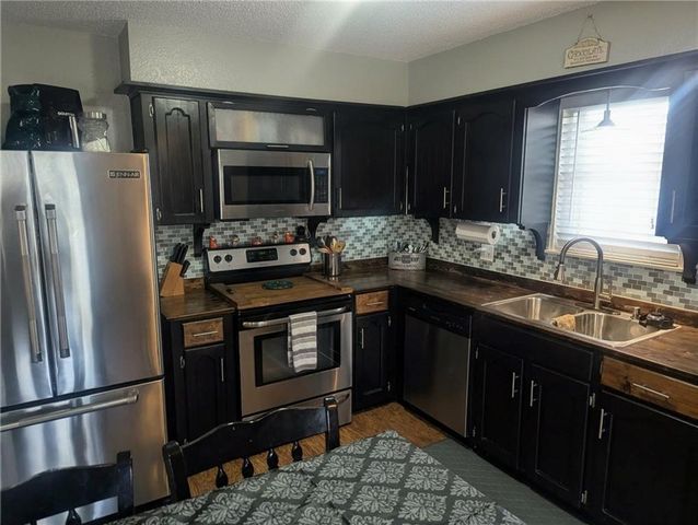 308 SW MOORE Place, Blue Springs, MO 64015