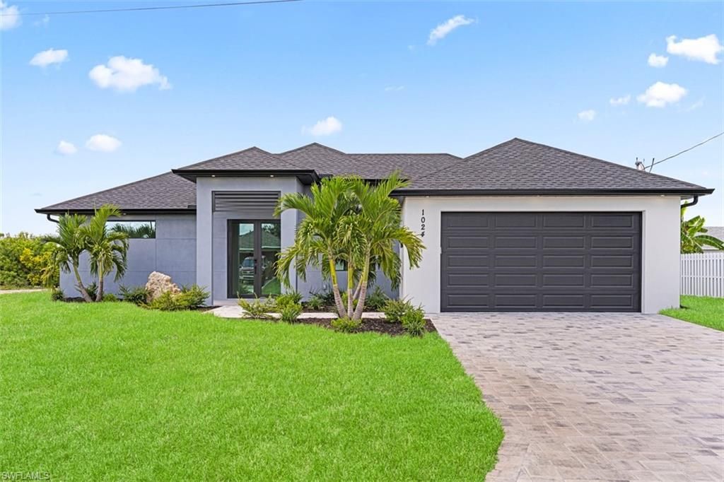 1024 NE 1st PL, CAPE CORAL, FL 33909 — exterior