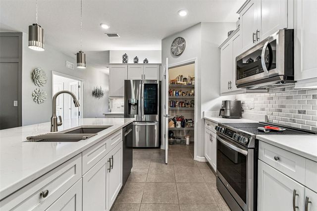 32813 SAND CREEK DRIVE, Wesley Chapel, FL 33543