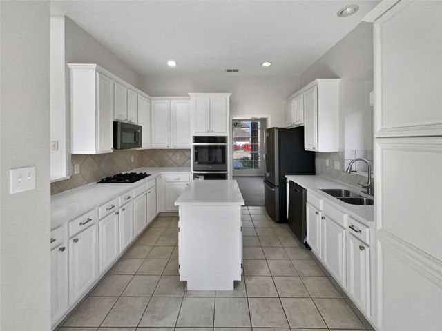 9722 Links Fairway Drive, Rowlett, TX 75089