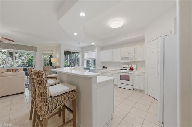 1634 Tarpon Bay DR S # 102, Naples, FL 34119