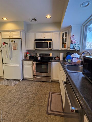 15 Canterbury Drive, Coram, NY 11727