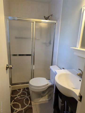 15 Canterbury Drive, Coram, NY 11727