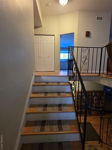 15 Canterbury Drive, Coram, NY 11727