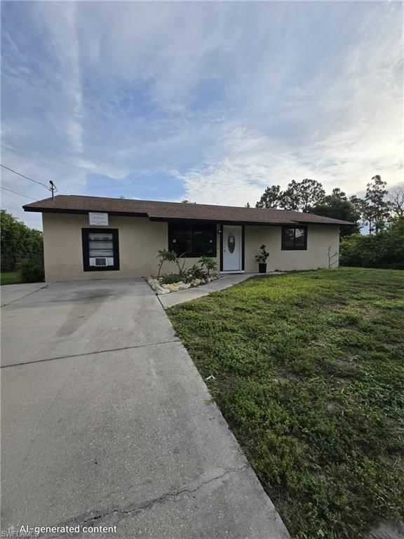 2816 9th ST SW, LEHIGH ACRES, FL 33976 — exterior