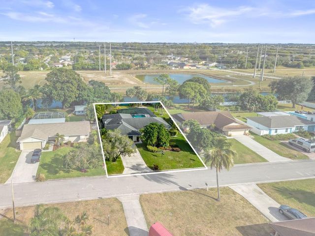 256 Sandpiper Avenue, Royal Palm Beach, FL 33411