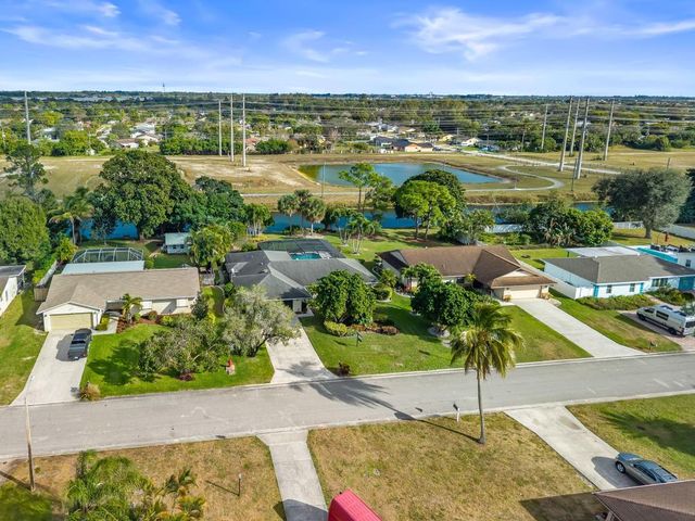 256 Sandpiper Avenue, Royal Palm Beach, FL 33411