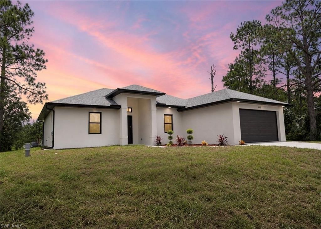 605 E 14th ST, LEHIGH ACRES, FL 33972 — exterior