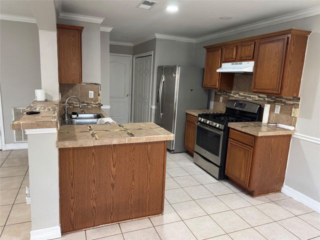 11727 Rolling Stream Drive, Tomball, TX 77375
