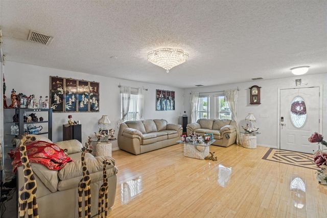 7506 FORDHAM CREEK LANE, Orlando, FL 32818