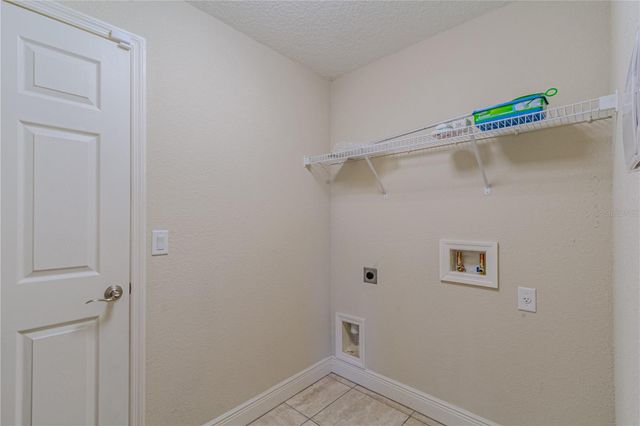 8593 PLUMERIA AVENUE, Orlando, FL 32825