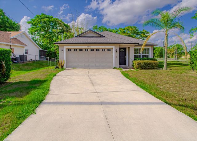 8593 PLUMERIA AVENUE, Orlando, FL 32825