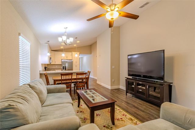 8593 PLUMERIA AVENUE, Orlando, FL 32825