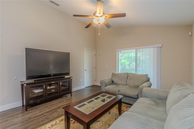 8593 PLUMERIA AVENUE, Orlando, FL 32825