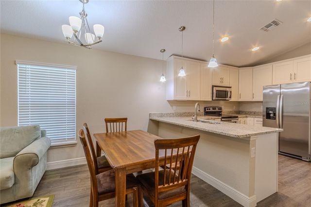 8593 PLUMERIA AVENUE, Orlando, FL 32825