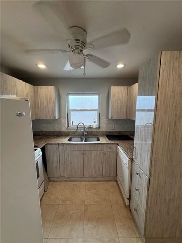 1150 E Sample Road 101, Pompano Beach, FL 33064