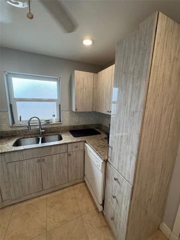 1150 E Sample Road 101, Pompano Beach, FL 33064