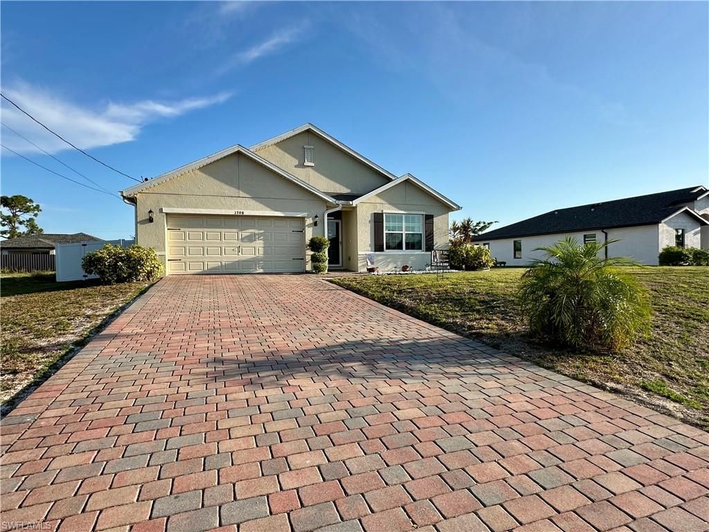 1708 NW 29TH TER, CAPE CORAL, FL 33993 — exterior