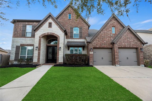 10323 Millcreek Manor Lane, Cypress, TX 77433