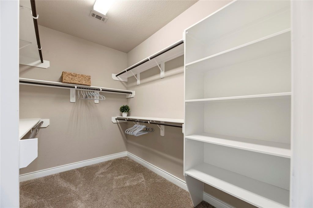 Image 21 of property listing at 10323 Millcreek Manor Lane, Cypress, TX 77433