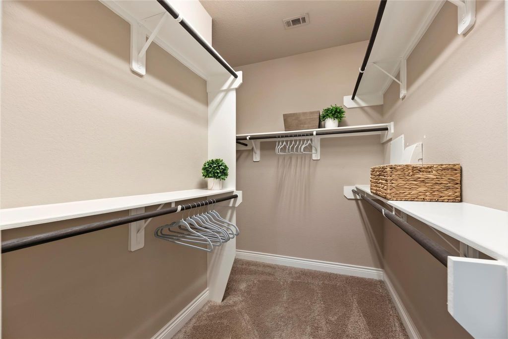 Image 22 of property listing at 10323 Millcreek Manor Lane, Cypress, TX 77433