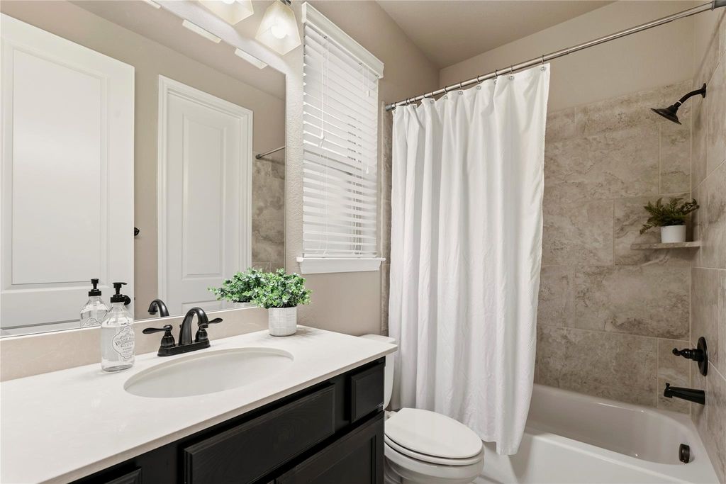 Image 25 of property listing at 10323 Millcreek Manor Lane, Cypress, TX 77433