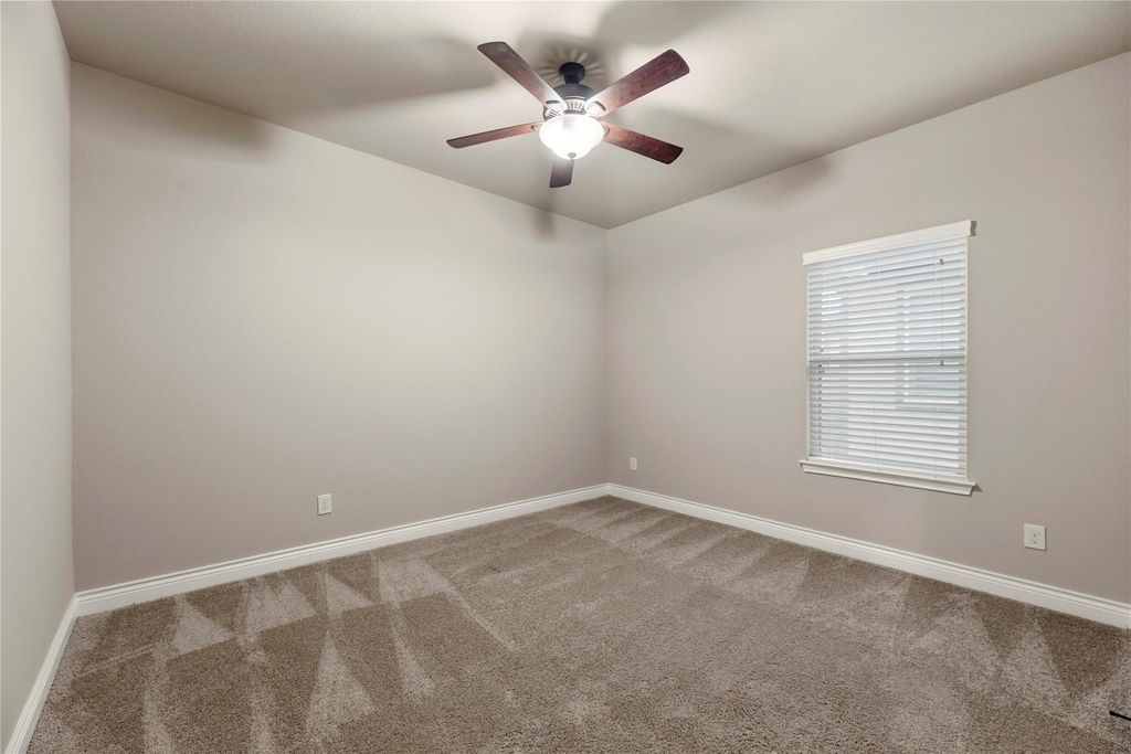 Image 33 of property listing at 10323 Millcreek Manor Lane, Cypress, TX 77433