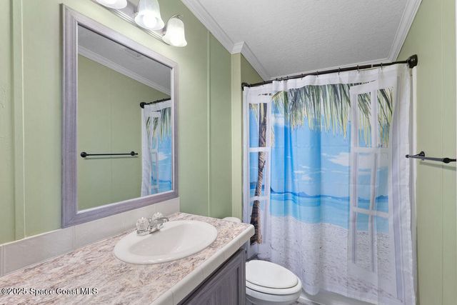 805 Beech Court, Barefoot Bay, FL 32976