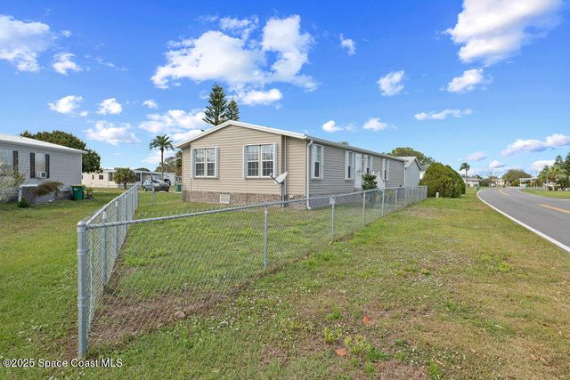 805 Beech Court, Barefoot Bay, FL 32976
