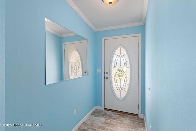 805 Beech Court, Barefoot Bay, FL 32976