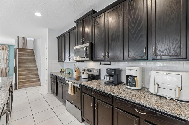 9001 SUNSHINE RIDGE LOOP, Kissimmee, FL 34747