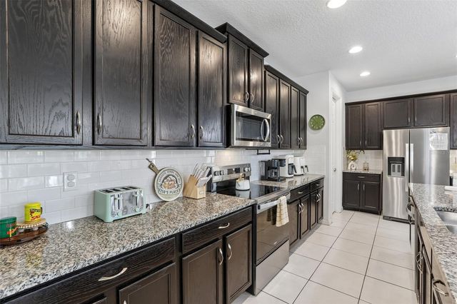 9001 SUNSHINE RIDGE LOOP, Kissimmee, FL 34747