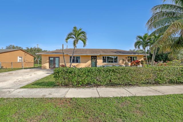 1476 N Mangonia Drive, West Palm Beach, FL 33401
