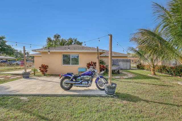 1476 N Mangonia Drive, West Palm Beach, FL 33401