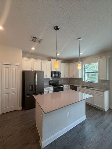 1206 PAYNE STEWART DRIVE, Davenport, FL 33896