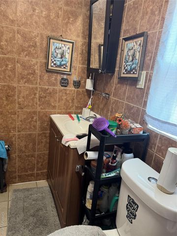 9413 116th Street, Richmond Hill, NY 11419