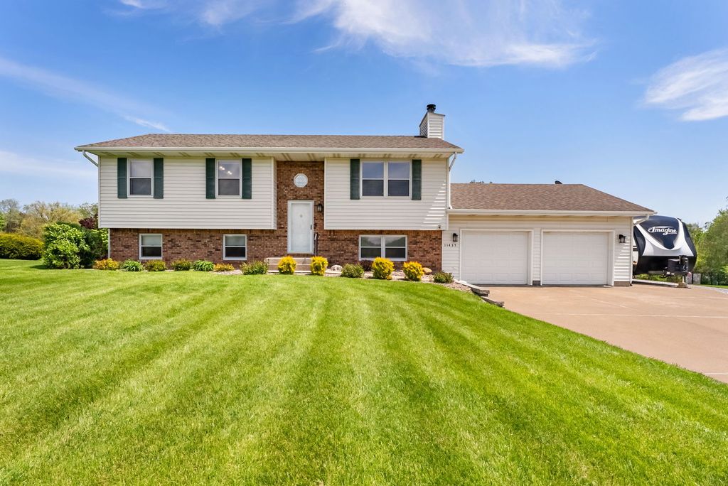 Image 1 of property listing at 11435 95th Avenue, Blue Grass, IA 52726